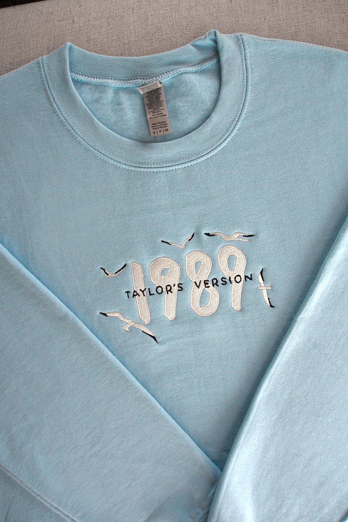 Taylor Swift 1989 Embroidered Sweatshirt | Light Blue